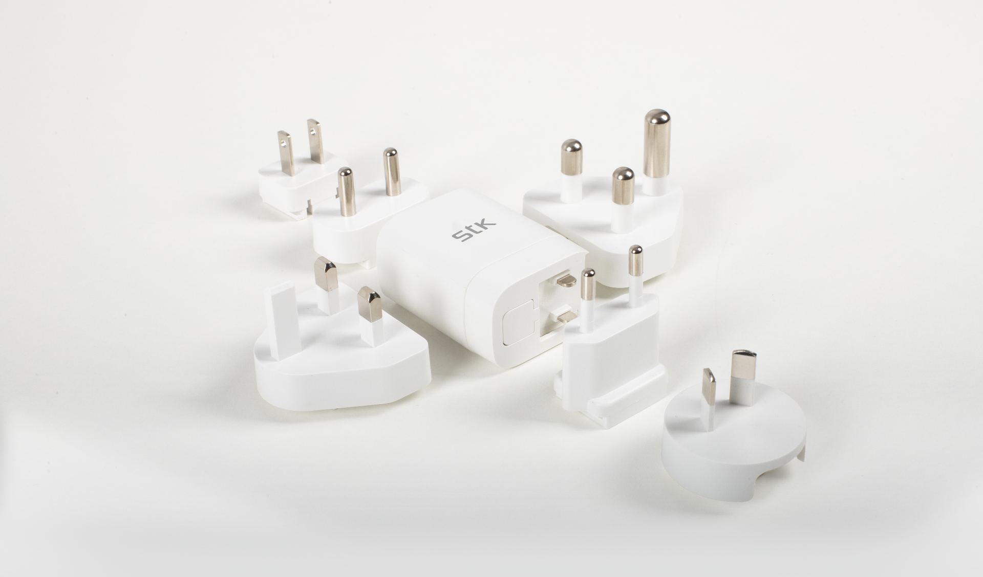 STK global charger with interchangeable regional plugs and USB-C cable